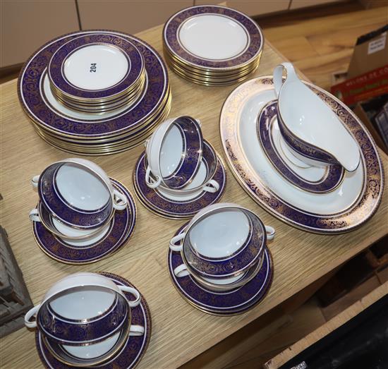 A Royal Doulton Imperial blue dinner service